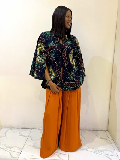 Wide legs orange trouser with a bold statement Ankara stoned cape jacket